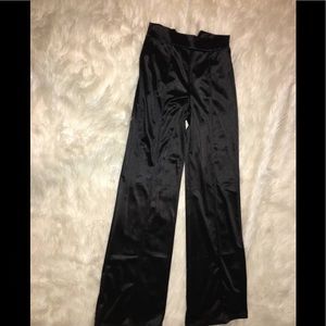 Black satin wide leg pants from Fashion Nova